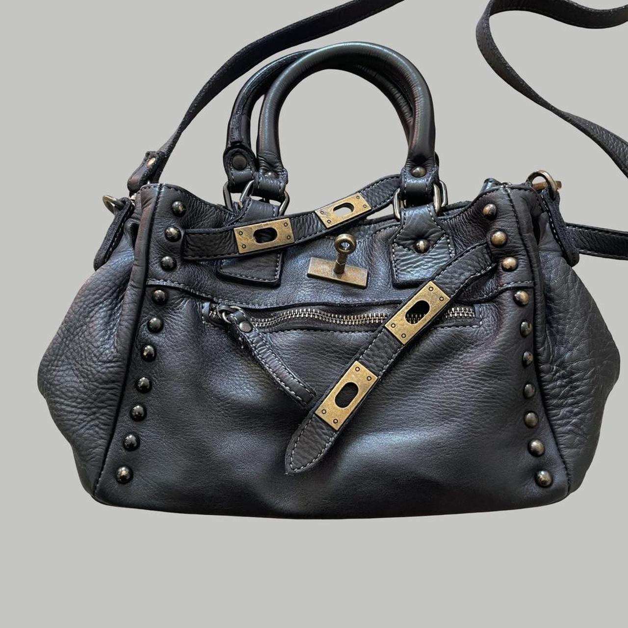 Black (small) leather firkin bag with studs.