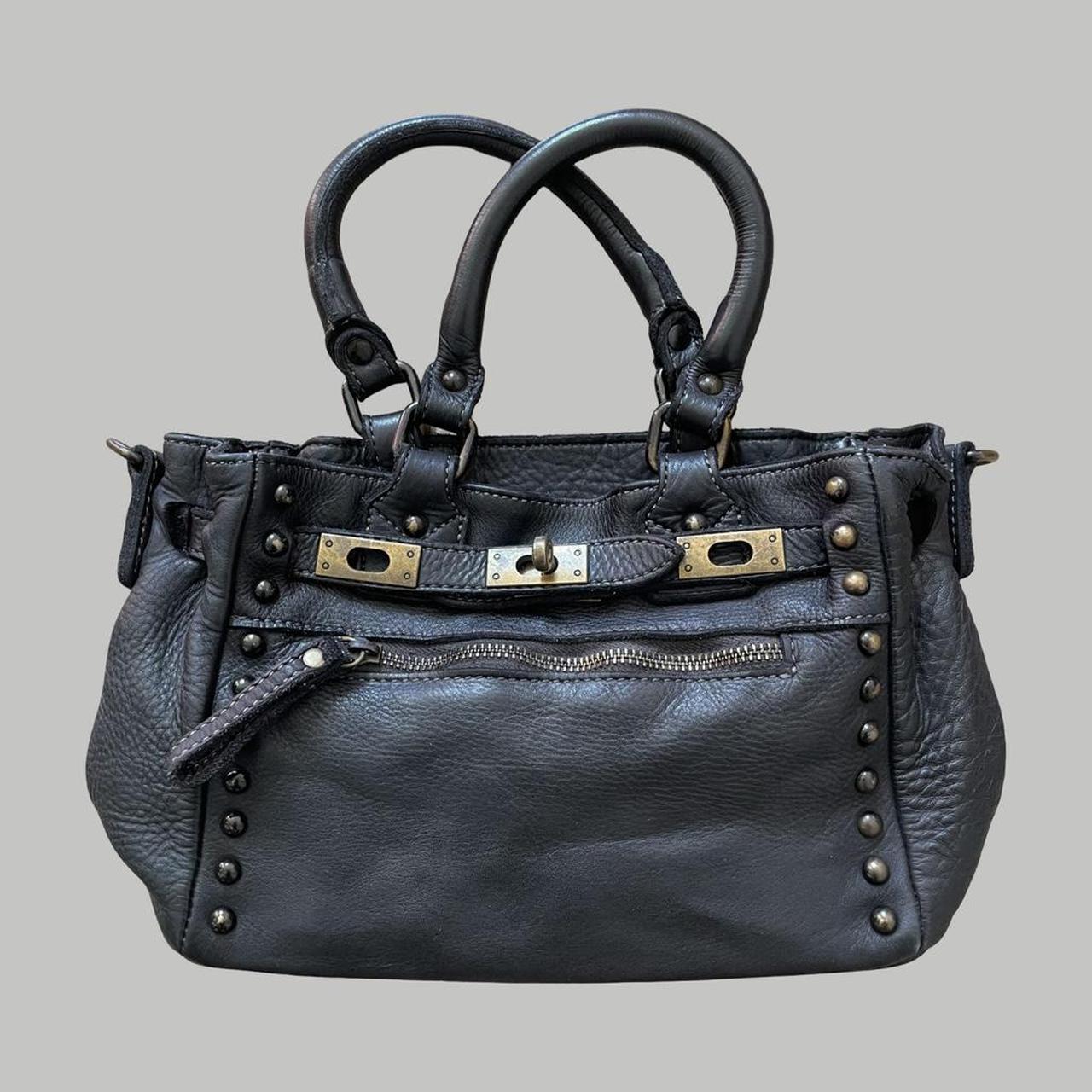 Black (small) leather firkin bag with studs.